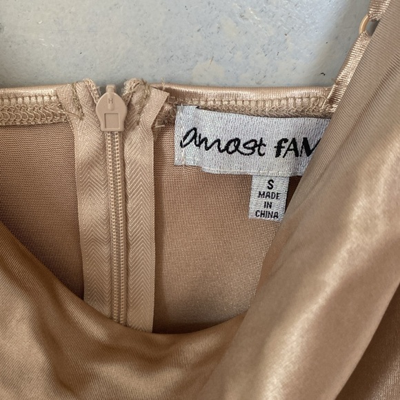 Champagne/gold piece that is shorts in the bottom but looks like a dress - Picture 2 of 3